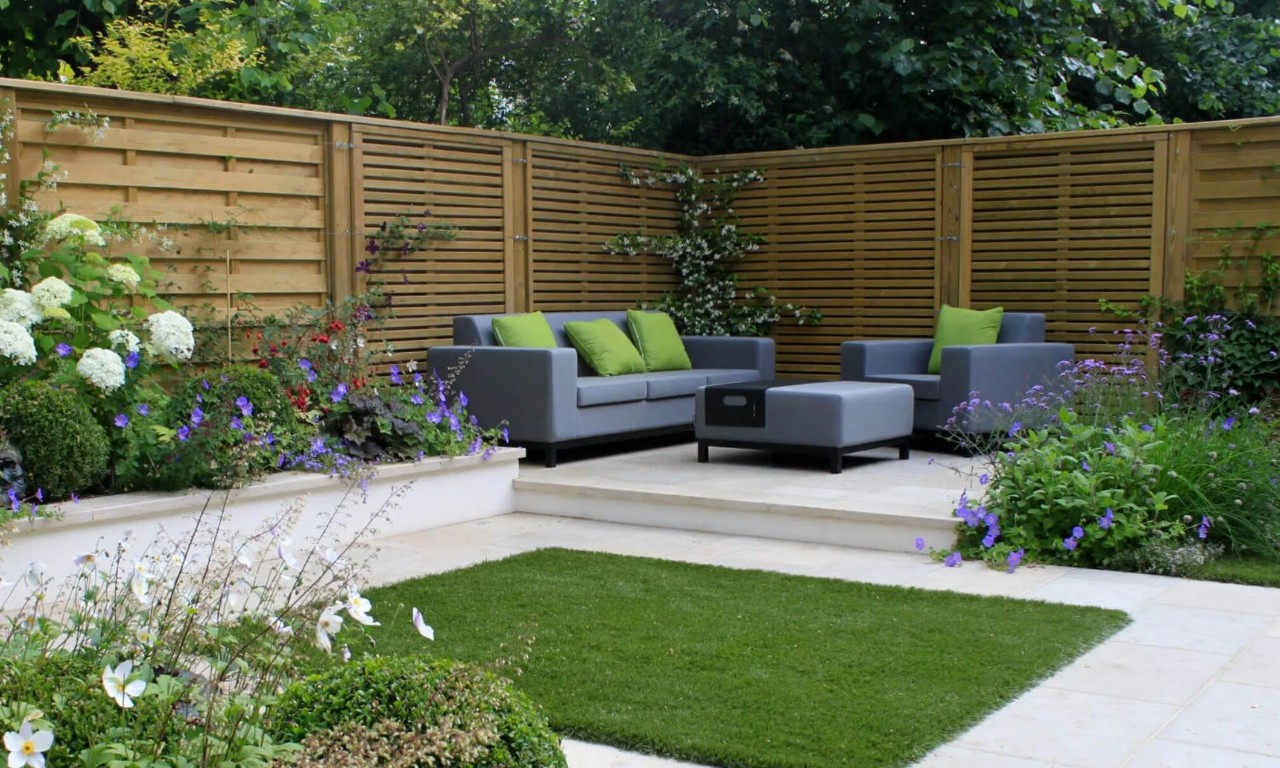 Modern landscaped patio with comfortable seating and professional design